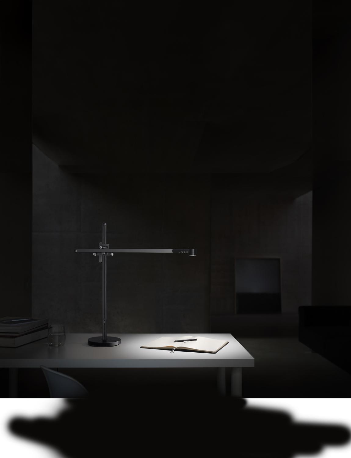Lightcycle illuminating a notebook and pen